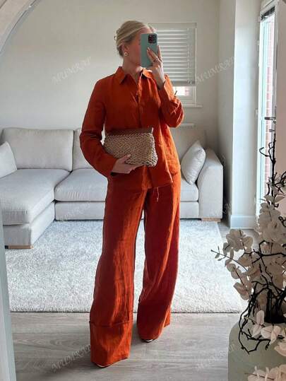 بدلة نسائية كاجوال 2 قطعة، قميص طويل الأكمام بياقة امامية، وبنطال واسع الخصر
