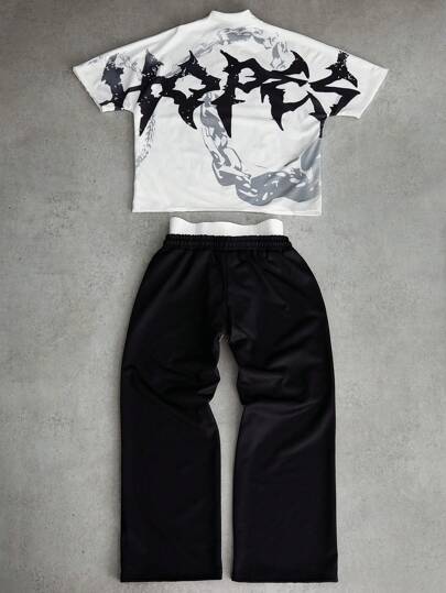 Manfinity Streetrush طقم رياضي رجالي بطراز الشارع مستوحى من تصميم الشارع العالي، بميزات جرافيك ضخمة، وطباعة الحروف والخطوط في طقم قميص أبيض وأسود متباين. قميص كم خفاش ذو فتحة كبيرة بتفاصيل خصر 2 في 1 وبنطلون بولو أسود. هذا الطقم من علامة الأزياء الشارعية