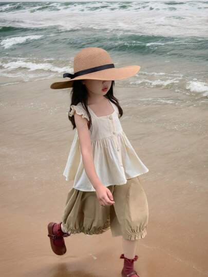 قبعة كبيرة الحافة من القش الورقي لحماية الأطفال من الشمس، قبعة شمس صيفية للأطفال مع شريط ربطة عنق سوداء، قبعة من القش الورقي بلون البن مجدولة، للأطفال الرضع/البنات الصغيرات، قبعة شاطئ فسيحة للعطلات