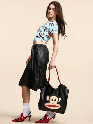 Paul Frank X 1 قطعة حقيبة كتف زخرفية بطباعة جلد PU بنمط كرتوني، مناسبة للرجال والنساء والمراهقين والطلاب، مناسبة للتنقل والسفر والخروج والتسوق، تستوعب أجهزة الكمبيوتر المحمول 16 بوصة والكتب والمحافظ وأكواب المياه، قرد، وأنيقة