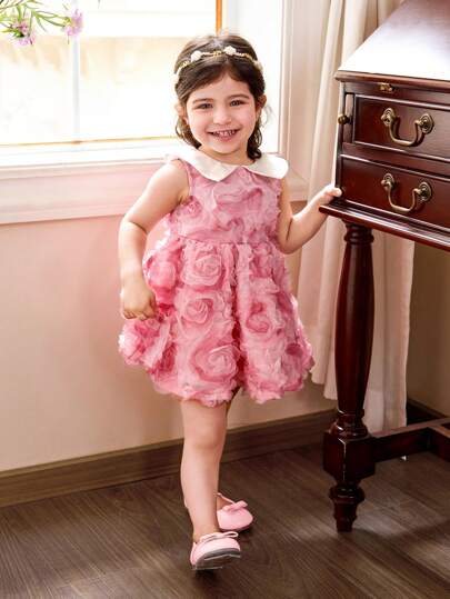 فساتين بيبي فستان أنيق وجذاب للبنات في الصيف، وردي فاتح بطبعات زهور، برقبة مرتعشة بقصة شبكية بدون أكمام