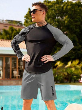 Manfinity Swimmode 2 قطعة / مجموعة بدلة سباحة رجالية بأكمام مع تباين لوني مع شورت، بطراز هاواي