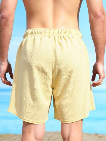 Manfinity Swimmode شورتات شاطئية للرجال بلون أحادي، موضة الصيف