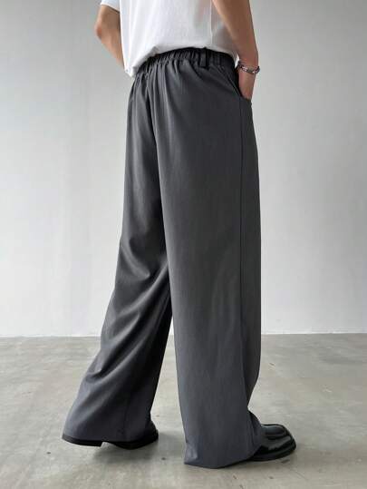 Manfinity Mode بنطلون رجالي بخصر كبير بتجاعيد وساقين واسعة مرتخية للاستخدام اليومي