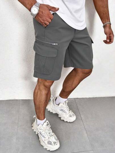 Manfinity Homme بنطال شورت كاجوال أمامي مزود بسحاب وجيب كارجو للرجال، لون أحادي