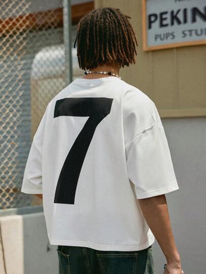 Manfinity Streetrush قميص T قصير رجالي فضفاض بتصميم بسيط وأنيق، قميص شارع رجالي بطباعة جرافيك حردش رياضي