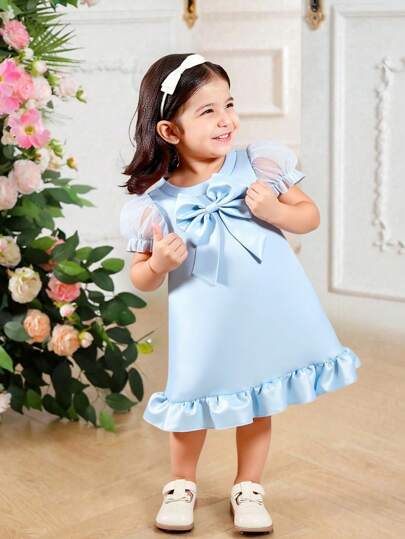 فساتين بيبي Glamorique Kids فستان أنيق وشامل للمناسبات المختلفة للأطفال البنات، باللون الأزرق، به فيونكة مقاس كبير وأكمام متفرقة من التل اللامع والشبك وحاشية فرشاة من قماش الساتان اللامع، مناسب لحفلات عيد الميلاد والربيع/الصيف