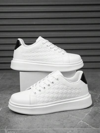 أحذية رياضية كاجوال سهلة الارتداء للرجال، بتصميم دائري ملمس ثلاثي الأبعاد بلون أسود وأبيض، بنعل مريح مناسب للارتداء اليومي في جميع المواسم