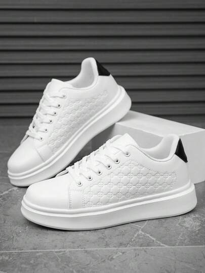 أحذية رياضية كاجوال سهلة الارتداء للرجال، بتصميم دائري ملمس ثلاثي الأبعاد بلون أسود وأبيض، بنعل مريح مناسب للارتداء اليومي في جميع المواسم