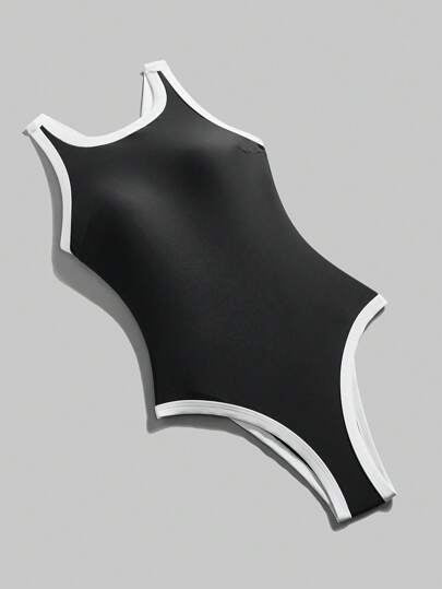 مايوه حريمي قطعة واحدة Ontre ملابس سباحة نسائية موديل جديد 2022، بدلة سباحة قطعة واحدة، باللون الأسود مع تباين لون المشمش، تصميم ظهر متقاطع ، كاجوال وأنيق ، ملابس شاطئ