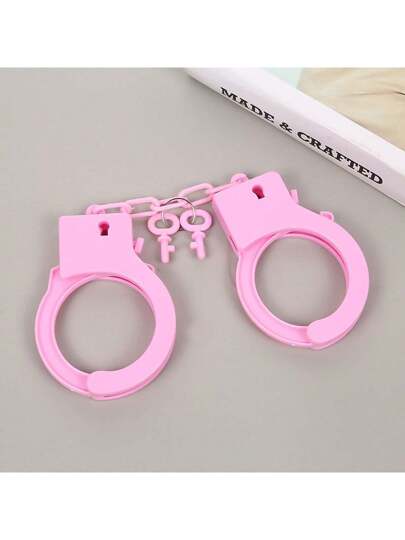 1 قطعة طقم أصفاد يدوية من مادة الراتنج متعددة الألوان - مناسبة جداً للمرح في الهواء الطلق، مثيرة للاهتمام ولا تحتاج إلى طاقة، لعبة أجواء حفلة الكرنفال