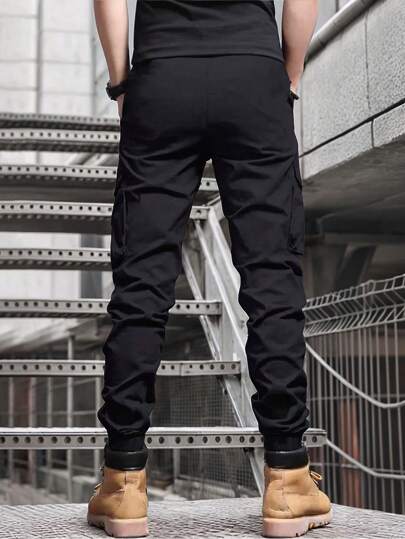 Manfinity Homme بنطلون كاجوال للرجال بخصر قابل للشد وخصر ايلاستيكي وجيوب للحمل