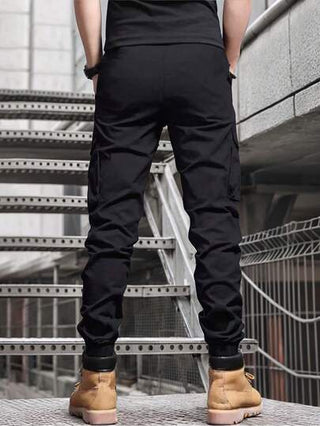 Manfinity Homme بنطلون كاجوال للرجال بخصر قابل للشد وخصر ايلاستيكي وجيوب للحمل