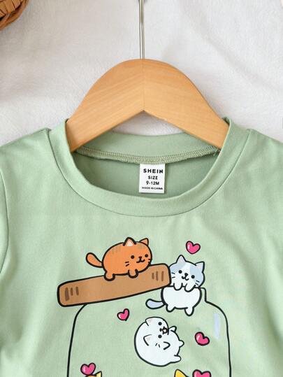 مجموعة من قطعتين لطفلة رضيعة/ صغيرة من عمر 0-3 سنوات، تتكون من تي شيرت كم قصير بطباعة قطة جميلة وشورت، بلون أخضر التفاح، ملابس ربيعية/صيفية للطفل