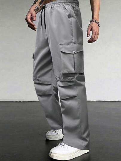 Manfinity EMRG بنطلون رجالي كاجوال بجيوب كارجو ذو خصر مطاطي قابل للسحب، لون أحادي