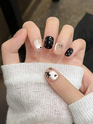 10 قطع أظافر صناعية قصيرة على شكل عين قطة سوداء مرسومة بالنقط والقلوب، مصممة يدوياً، إكسسوارات أظافر أنيقة للنساء