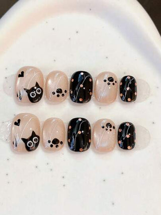 10 قطع أظافر صناعية قصيرة على شكل عين قطة سوداء مرسومة بالنقط والقلوب، مصممة يدوياً، إكسسوارات أظافر أنيقة للنساء