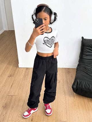 girls-sets حزام شحن ملون بلون واحد وتي شيرت قلب مطبوع وحرف لفتاة صغيرة في سن المراهقة ، 2 قطعة / مجموعة