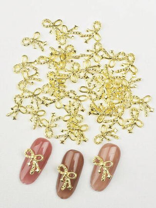 40 قطعة من اكسسوارات حلقة الشريط ثلاثية الأبعاد لتزيين الأظافر، اكسسوارات معدنية لامعة بشكل فيونكة مناسبة لتزيين الأظافر