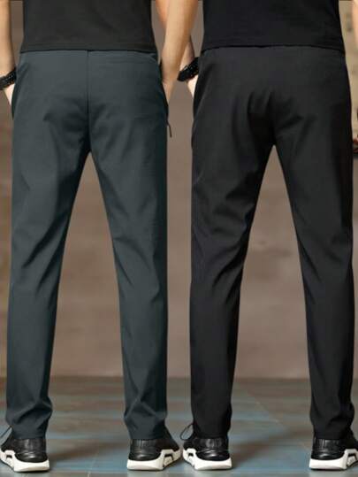 Manfinity Homme بنطلون كاجوال رجالي برباط خصر وجيوب بطباعة رسائل، متعدد الاستخدامات