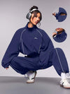 Streetz SHEIN Sport بذلة رياضية نسائية تتكون من ملابس علوية بياقة مرتفعة وأكمام طويلة وبنطال، مع تريم متباين اللون