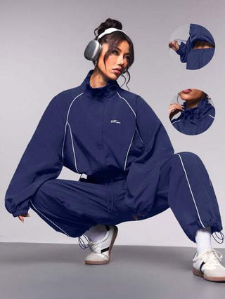 Streetz SHEIN Sport بذلة رياضية نسائية تتكون من ملابس علوية بياقة مرتفعة وأكمام طويلة وبنطال، مع تريم متباين اللون