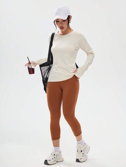 SHEIN Sport Studio سرواليل رياضية بسيطة ذات موحد اللون للسيدات