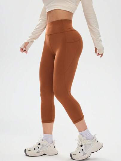 SHEIN Sport Studio سرواليل رياضية بسيطة ذات موحد اللون للسيدات