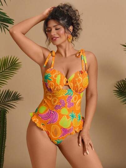 Travachic بدلة سباحة قطعة واحدة للمقاسات الكبيرة ذات طراز اميرة مع رباطات على الكتف وطبعات فاكهة استوائية ملونة وذيل منقوش، مبتكرة للتناسب والتنحيف