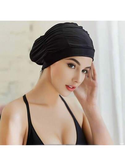 قبعة السباحة الكبيرة هذه للسيدات. إنها مريحة للارتداء دون الضغط على الرأس. التصميم مرن وناعم وقابل للتنفس. إنها تحمي الشعر الطويل وهي قبعة سباحة قابلة للإطالة تناسب جميع أشكال الرؤوس. إنها مناسبة جدًا للسباحة وحدائق المياه والشواطئ وتدريب السباحة...