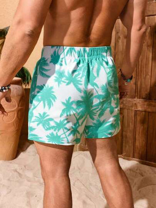 Manfinity Swimmode بدلة سباحة رجالية مريحة مع جيوب وطباعة شجرة النخيل ذات خصر مطاطي وسحاب ، طراز هاواي