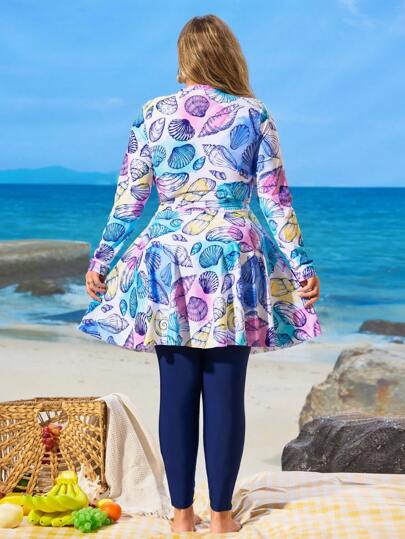 Swim Shayni بدلة سباحة محتشمة للمرأة بحجم كبير من قطعتين مع أكمام طويلة وبنطلون، بطراز إسلامي ، بطباعة رقمية على شكل أصداف بحرية، تصميم سحاب أمامي، للشاطئ والرحلات