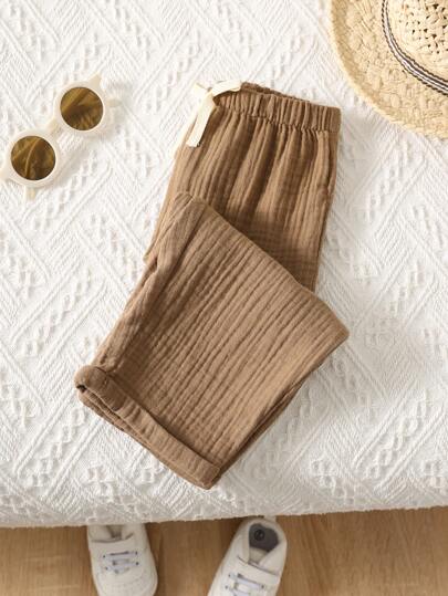 SHEIN بنطلون صيفي أطفال بناتي/بنات مريح مرتخي ذو خصر مطاطي مطوي فضفاض باللون البني الكافيه