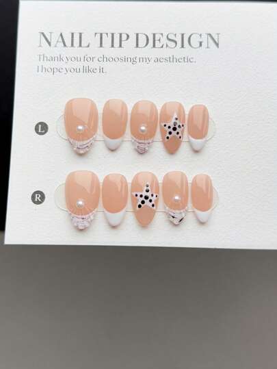 10 قطع من ألسنة الأظافر القصيرة ذات الشكل اللوزي اليدوية، بطراز أنيق وعصري، مزخرفة باللون الأبيض مع نقوش هيكل اللؤلؤ والنجوم على أرضية نقاط سوداء، بطريقة فرنسية غير منتظمة على قاعدة الأظافر ال- nude، مجموعة تزيين أظافر أنيقة للسيدات والفتيات
