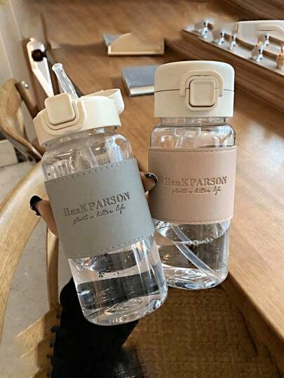 قطعة واحدة كوب قش بغطاء جلد PU، عازل للحرارة ومانع الانزلاق، جسم كوب شفاف، متوفر باللون الوردي/الرمادي، تصميم غطاء قابل للطي، شرب مريح، كوب مياه محمول، مناسب للمكتب/السفر، طراز بسيط، شرب صحي، تحسين نوعية الحياة، زجاجة مياه رياضية، جيد للصحة، زجاجة...