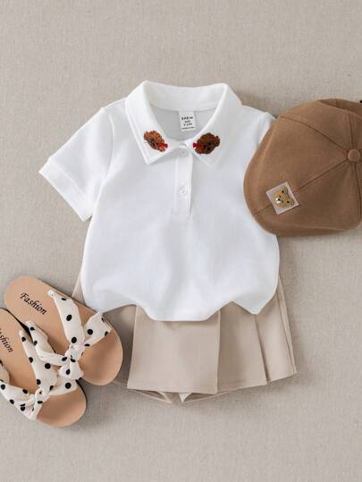 PrepCrw طقم قميص قصير الأكمام بياقة بولو وتنورة منبعجة بقطعتين للبنات الصغار بأسلوب كلية