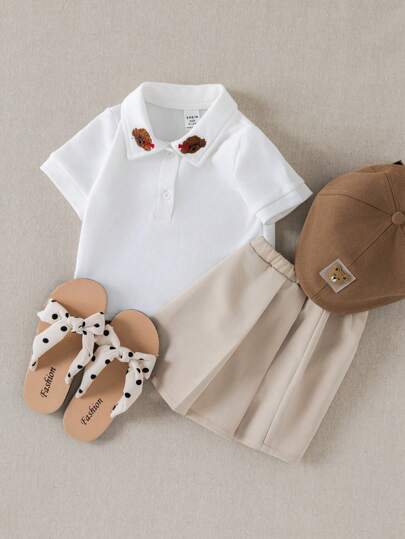 PrepCrw طقم قميص قصير الأكمام بياقة بولو وتنورة منبعجة بقطعتين للبنات الصغار بأسلوب كلية