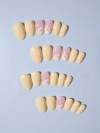 ارتقي بأناقتك مع مجموعة 24 قطعة أظافر مزيفة قصيرة بشكل بيضاوي مع أزهار وألوان ماكرون فرنسية، أظافر أكريليك مزيفة كاملة الملائمة ، تحتوي على 1 قطعة هلامي لاصق و 1 ملف أظافر، مناسبة للنساء والفتيات لاستخدامها في العمل اليومي والدراسة والحفلات