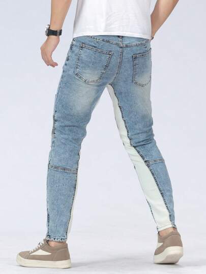 Manfinity LEGND جينز رجالي عصري ضيق وممزق ذات تصميم نحيف