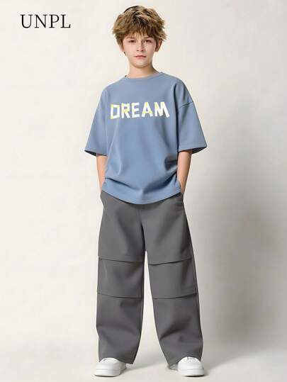 مايوه حريمي قطعة واحدة مجموعة سراويل ذات لون قُطني و ملابس علوية قصيرة الأكمام مطبوعة بحرف للأولاد 2 قطعة