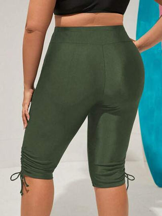 SHEIN Swim سراويل سباحة متوسطة الطول بسحاب بسيطة بلون واحد مقاس كبير للنساء