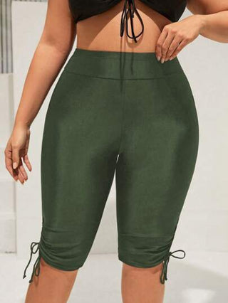 SHEIN Swim سراويل سباحة متوسطة الطول بسحاب بسيطة بلون واحد مقاس كبير للنساء