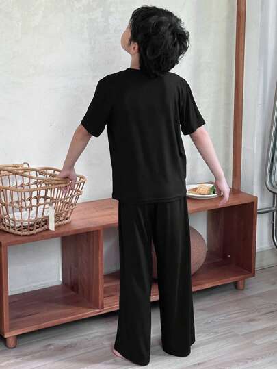 DAZY زي الأطفال لفصل الخريف: طقم للأولاد الصغار/المراهقين, قميص تريكو بأكمام قصيرة وبياقة طاقم ذو لون واحد + بنطال بيجاما طويل