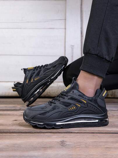 أحذية رياضية للرجال، أحذية رياضية سوداء كاجوال منفذة للهواء مع ترصيع وأربطة شباك