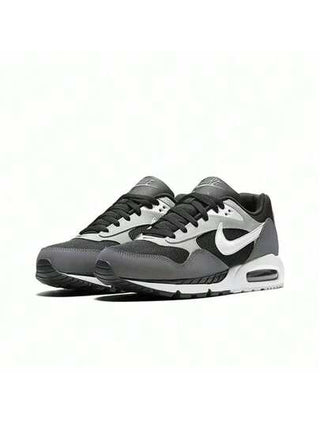 Nike أحذية ترفيهية كاجوال مريحة منخفضة الجزء العلوي من طراز اير ماكس كورليت، أحذية رياضية نمط الحياة، للجنسين باللونين الأسود والرمادي