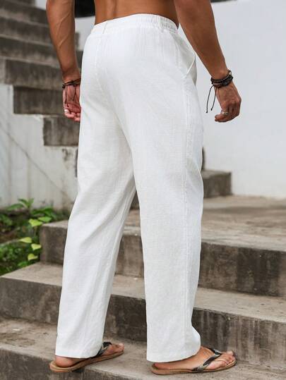 Manfinity Nomadique بنطلون عمل كاجوال للرجال بجيب وسحاب بلون أحادي