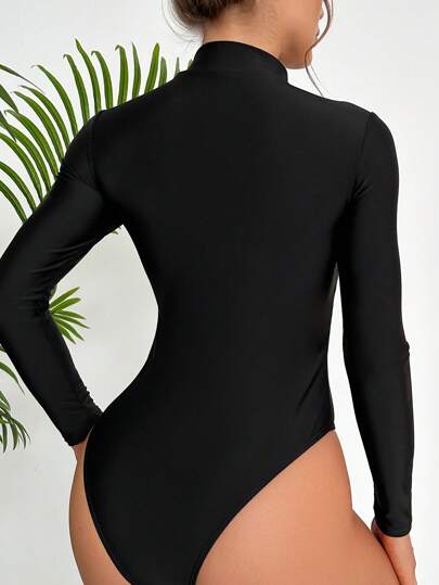 SHEIN Swim قطعة واحدة بلوزة نسائية طويلة الأكمام برقبة مزيفة، مطبوعة بزهور، للرياضات العشوائية والتزلج على الأمواج