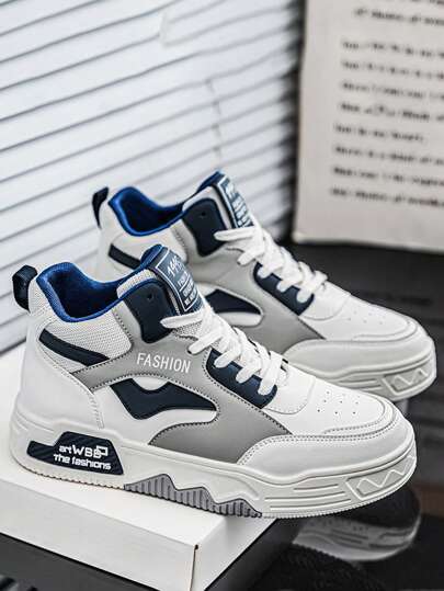 حذاء كاجوال رياضي للرجال من الجلد والشبك القابل للتنفس بنمط كلية راقي بنمط لون أحادي ، تصميم رباط علوي رياضي مريح للمشي والتزلج بسيط للأوقات الحرة