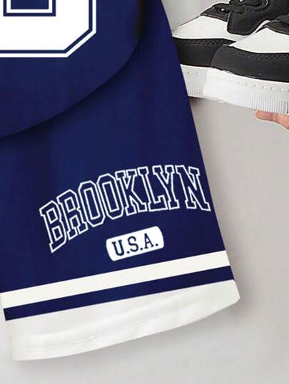 طقم ملابس رياضية (قميص برقبة طاقم وشورت أزرق) للأطفال الصغار، موديل بروكلين 23 مع رقعات، إطلالة صيفية، قطعتان