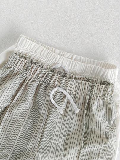 SHEIN Vintaside Kids 2 حبات مجموعة بنطلون أطفال بنين 4-7 سنوات ريفي بسيط عادي ، بسيط ، من القماش المنسوج ، مناسب للأنشطة الخارجية والاستخدام اليومي ، ربيع / صيف